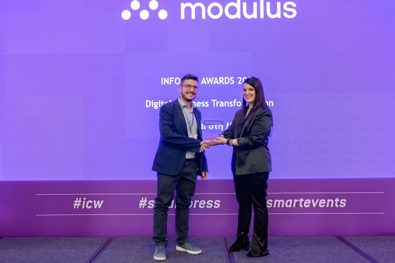 modulus receiving the Digital Business Transformation award at the InfoCom Awards 2025